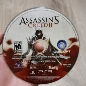 Assassins creed 2 game with red case